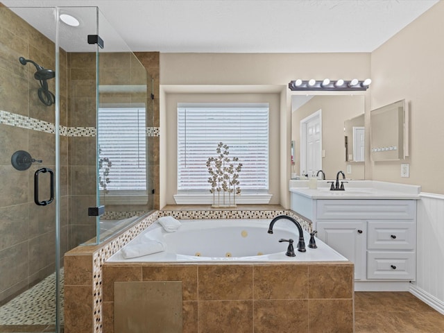 3139 Prairiestone Trail Ln, Katy, TX 77450 - bathroom with a jetted tub, vanity, and a stall shower