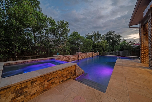 207 Fox Squirrel Ct, Pinehurst, TX 77362 - view of pool featuring a fenced backyard, a pool with connected hot tub, and a patio