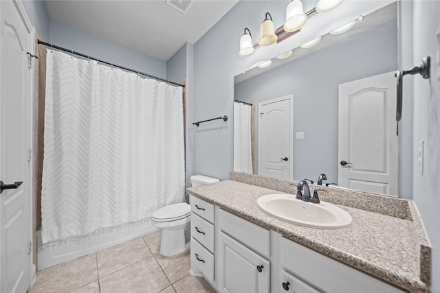 207 Fox Squirrel Ct, Pinehurst, TX 77362 - bathroom featuring vanity, tile patterned flooring, and shower / tub combo