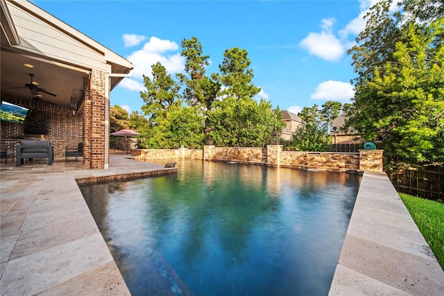 207 Fox Squirrel Ct, Pinehurst, TX 77362 - view of swimming pool featuring ceiling fan and a patio