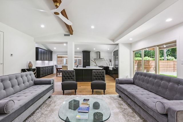 4543 Warm Springs Rd, Houston, TX 77035 - living room featuring healthy amount of natural light, light wood-style floors, and recessed lighting
