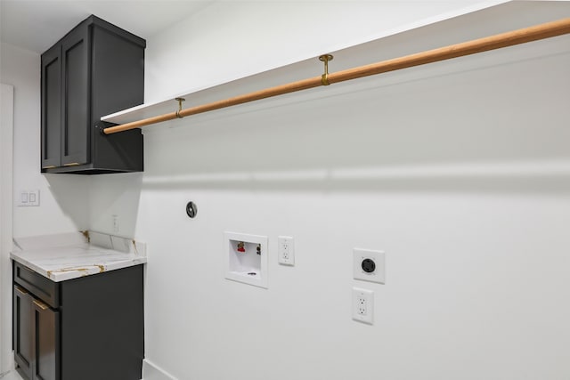 4543 Warm Springs Rd, Houston, TX 77035 - laundry room featuring electric dryer hookup, hookup for a washing machine, and cabinet space