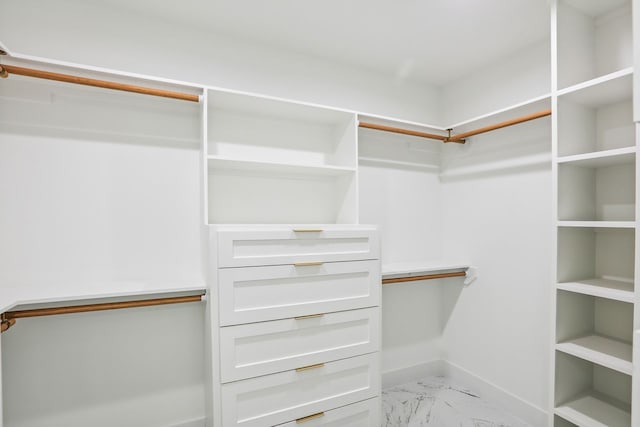 4543 Warm Springs Rd, Houston, TX 77035 - walk in closet featuring light marble finish flooring