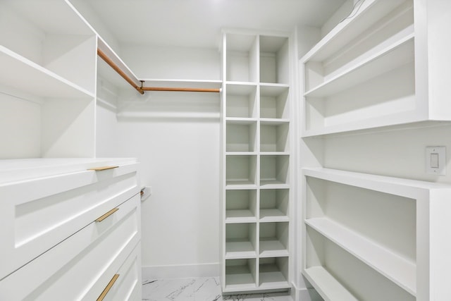 4543 Warm Springs Rd, Houston, TX 77035 - walk in closet with marble look tiles