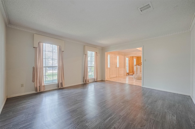 5318 Foresthaven Dr, Houston, TX 77066 - unfurnished room with wood finished floors, a textured ceiling, and ornamental molding