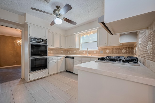 5318 Foresthaven Dr, Houston, TX 77066 - kitchen featuring appliances with stainless steel finishes, extractor fan, a chandelier, backsplash, and white cabinets