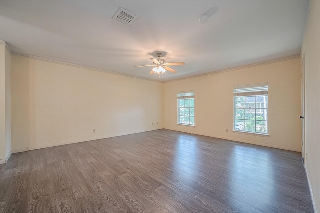5318 Foresthaven Dr, Houston, TX 77066 - empty room with wood finished floors, a ceiling fan, and crown molding