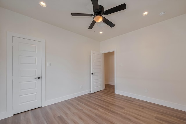 1026 W Cottage St, Houston, TX 77009 - unfurnished room featuring light wood-type flooring, a smoke detector, a ceiling fan, and recessed lighting