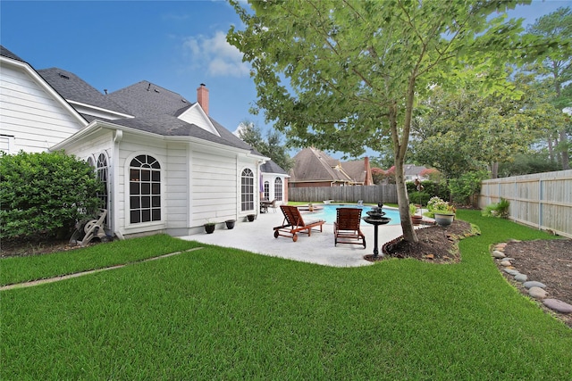 2206 Hickory Park Dr, Kingwood, TX 77345 - fenced backyard with a patio