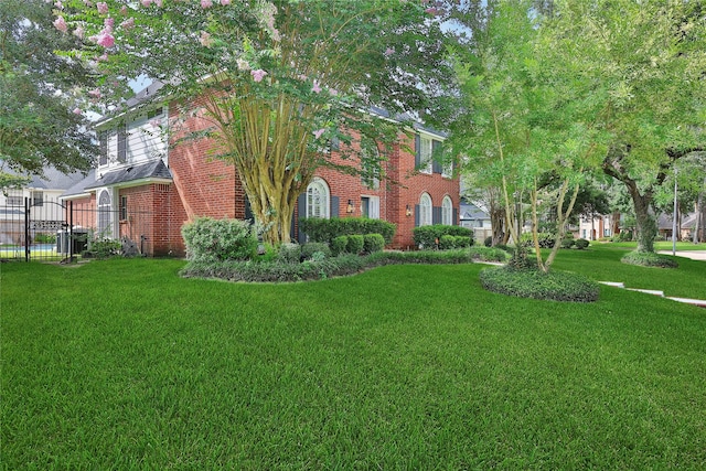 2206 Hickory Park Dr, Kingwood, TX 77345 - view of front facade featuring brick siding