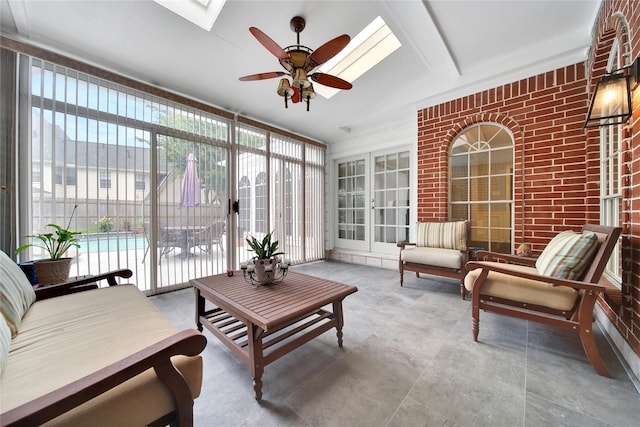 2206 Hickory Park Dr, Kingwood, TX 77345 - sunroom / solarium with a ceiling fan, an outdoor living space, a skylight, french doors, and lofted ceiling