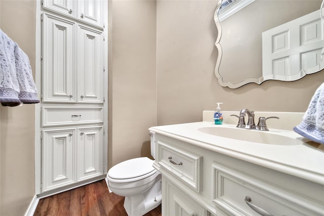 2206 Hickory Park Dr, Kingwood, TX 77345 - half bathroom featuring vanity and wood finished floors