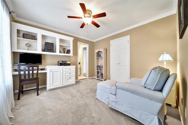 2206 Hickory Park Dr, Kingwood, TX 77345 - sitting room with ornamental molding, ceiling fan, light carpet, and an office area