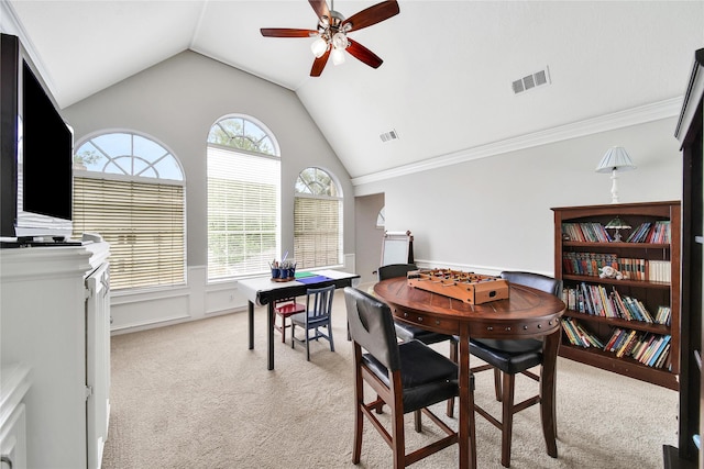 2206 Hickory Park Dr, Kingwood, TX 77345 - dining room with light colored carpet, vaulted ceiling, and ceiling fan
