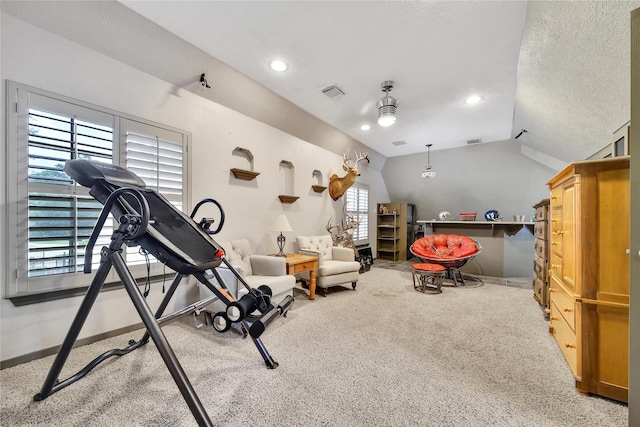 2206 Hickory Park Dr, Kingwood, TX 77345 - exercise room with vaulted ceiling, carpet floors, a textured ceiling, and recessed lighting