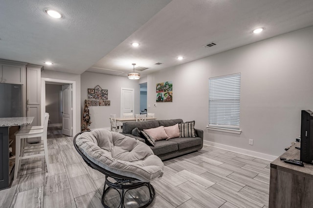 26752 Diamond Sq, Splendora, TX 77372 - living room with recessed lighting and wood finish floors