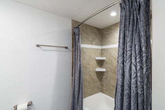 12239 Glenview Dr, Montgomery, TX 77356 - full bathroom featuring shower / bathtub combination with curtain