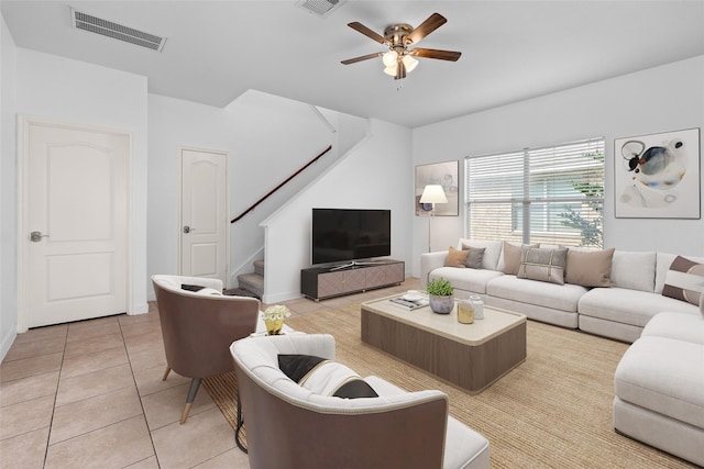 20523 Ranch Mill Ln, Cypress, TX 77433 - living room featuring stairs, light tile patterned floors, and ceiling fan