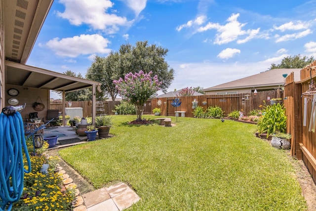 12114 Mabel Ln, Pinehurst, TX 77362 - fenced backyard featuring a patio