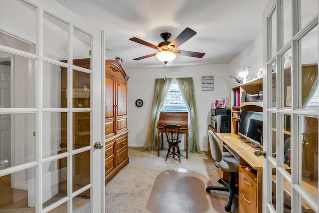 12114 Mabel Ln, Pinehurst, TX 77362 - home office featuring french doors, ceiling fan, and light carpet