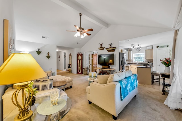 12114 Mabel Ln, Pinehurst, TX 77362 - living room featuring light carpet, beam ceiling, ceiling fan, high vaulted ceiling, and arched walkways