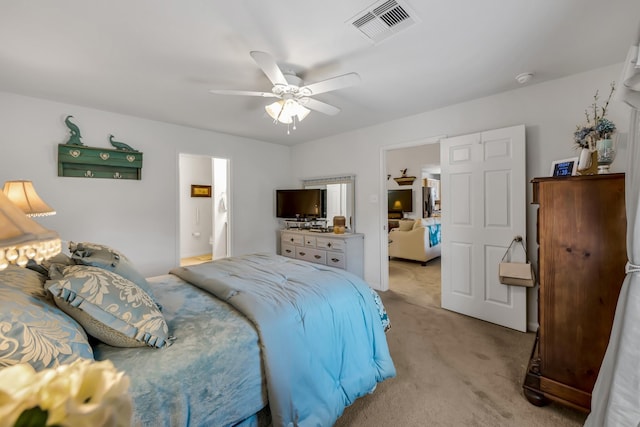 12114 Mabel Ln, Pinehurst, TX 77362 - bedroom with light carpet and a ceiling fan