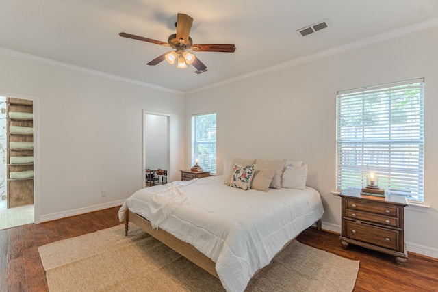 18988 Ocean Mist Ct, Montgomery, TX 77356 - bedroom with wood finished floors, ornamental molding, and ceiling fan