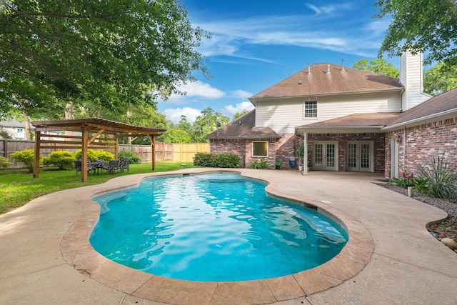 18988 Ocean Mist Ct, Montgomery, TX 77356 - view of pool featuring french doors, a patio, a fenced backyard, and a pergola