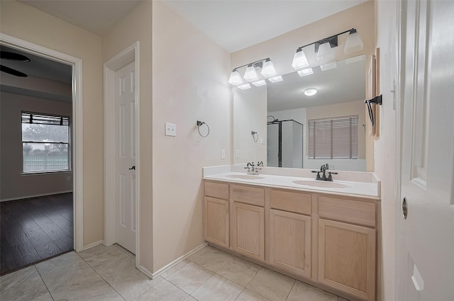 23035 Canal Rd, Richmond, TX 77406 - bathroom featuring double vanity, a shower, and tile patterned floors