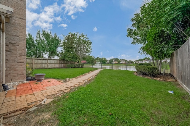 23035 Canal Rd, Richmond, TX 77406 - fenced backyard with a water view