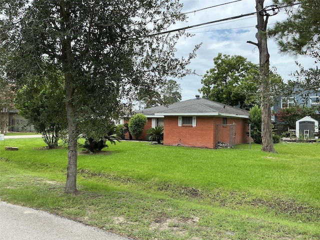 416 Fenn St, Houston, TX 77018 - view of side of home with a yard and brick siding