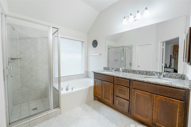 2627 Rosepoint Ct, Fresno, TX 77545 - bathroom with vaulted ceiling, double vanity, a bath, a stall shower, and tile patterned flooring