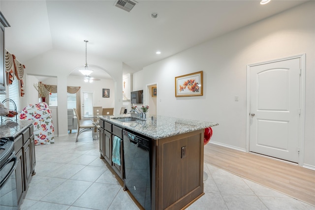 2627 Rosepoint Ct, Fresno, TX 77545 - kitchen featuring dishwasher, stainless steel stove, light stone counters, light tile patterned flooring, and pendant lighting