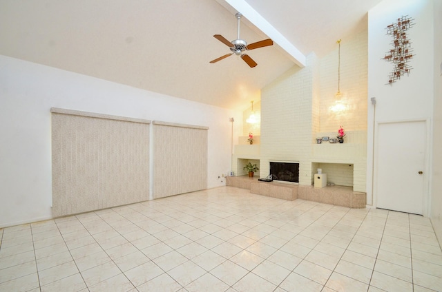 10723 Bexley Dr, Houston, TX 77099 - unfurnished living room with high vaulted ceiling, a ceiling fan, beamed ceiling, light tile patterned floors, and a tile fireplace