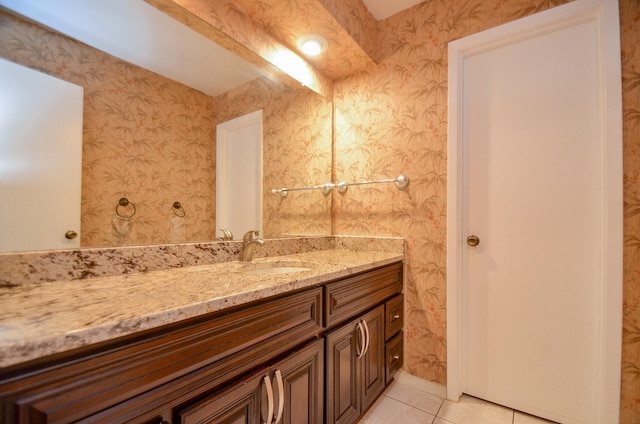 10723 Bexley Dr, Houston, TX 77099 - bathroom with vanity, wallpapered walls, and tile patterned floors