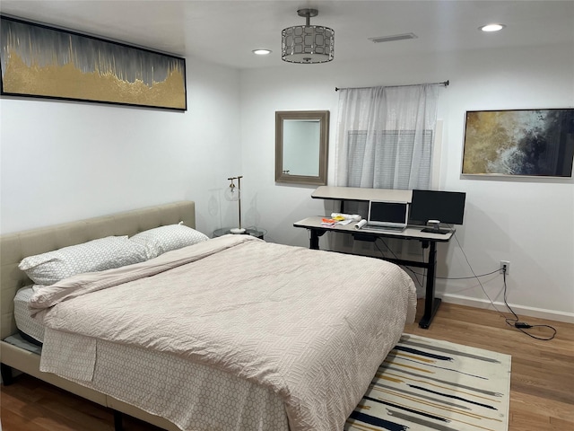 3140 Webster St, Houston, TX 77004 - bedroom featuring recessed lighting and wood finished floors