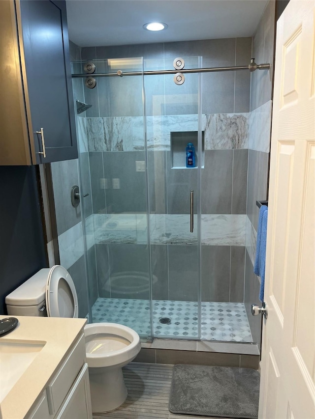 3140 Webster St, Houston, TX 77004 - bathroom with vanity, a shower stall, and recessed lighting