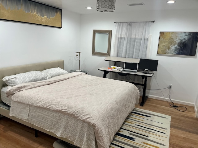 3140 Webster St, Houston, TX 77004 - bedroom featuring recessed lighting and wood finished floors