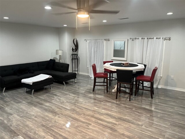 3140 Webster St, Houston, TX 77004 - dining space with wood finished floors, ceiling fan, and recessed lighting