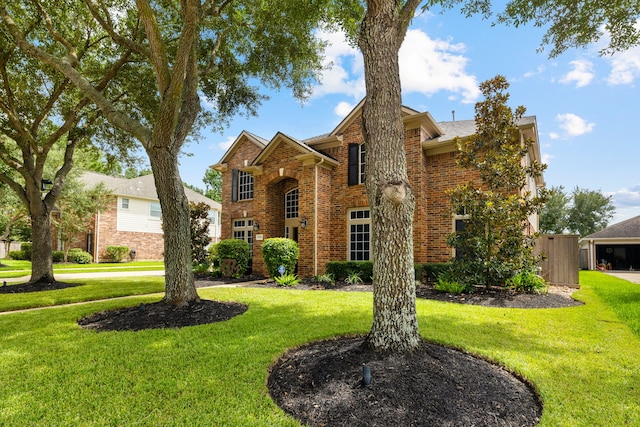 2006 Scarlet Trail Ct, Katy, TX 77494 - traditional-style home featuring brick siding and a front yard