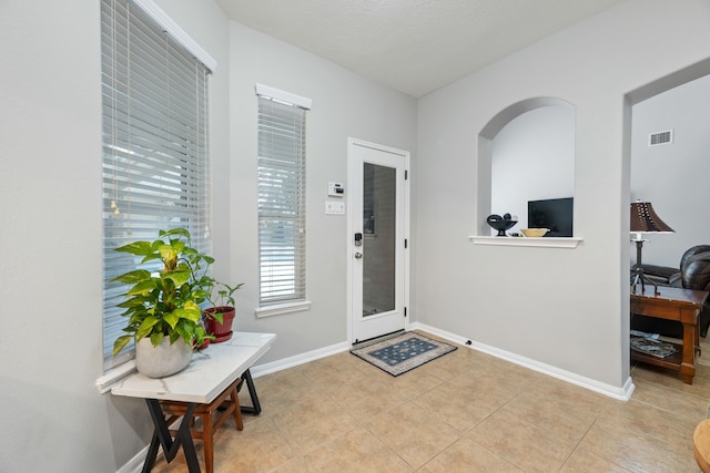 2006 Scarlet Trail Ct, Katy, TX 77494 - entryway featuring baseboards and light tile patterned floors