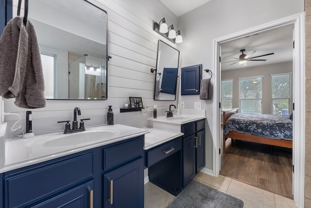 2006 Scarlet Trail Ct, Katy, TX 77494 - bathroom with vanity, connected bathroom, ceiling fan, tile patterned flooring, and a shower with door