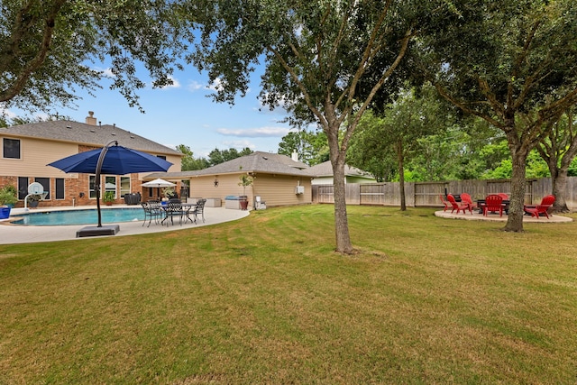 2006 Scarlet Trail Ct, Katy, TX 77494 - view of yard featuring a patio and an outdoor fire pit