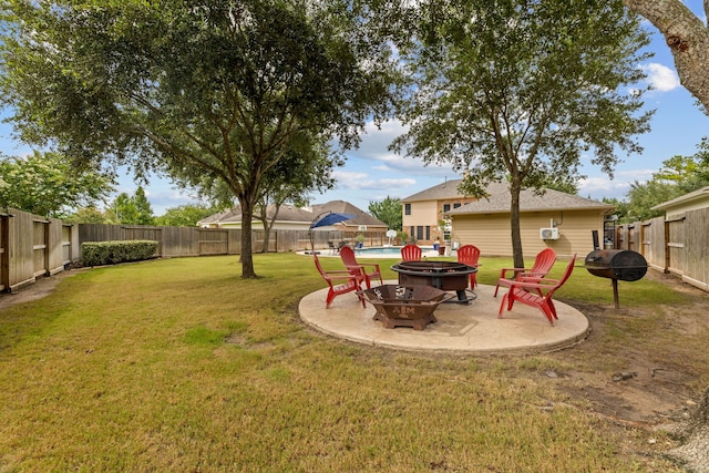 2006 Scarlet Trail Ct, Katy, TX 77494 - fenced backyard featuring a fire pit and a patio area
