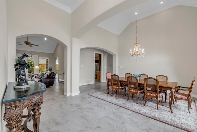 12715 Havant Cir, Houston, TX 77077 - dining room with arched walkways, ceiling fan, high vaulted ceiling, a chandelier, and recessed lighting