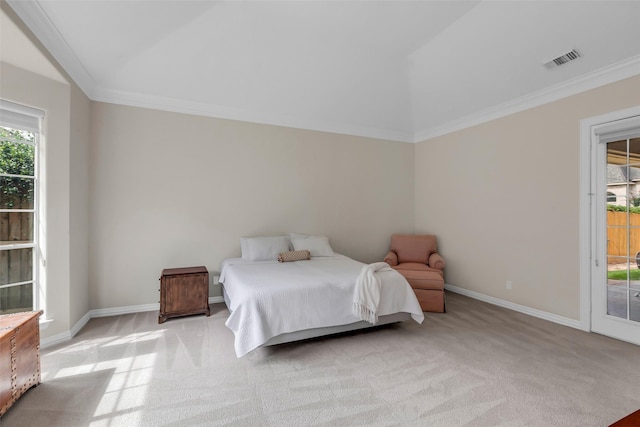 12715 Havant Cir, Houston, TX 77077 - bedroom with access to exterior, light carpet, ornamental molding, and vaulted ceiling