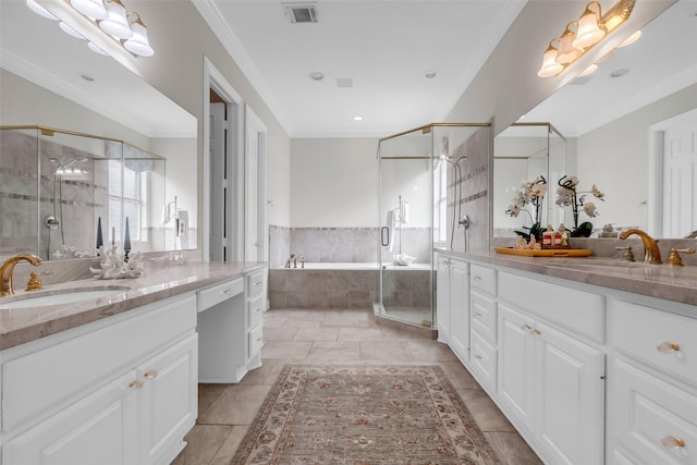12715 Havant Cir, Houston, TX 77077 - bathroom featuring two vanities, a garden tub, a stall shower, crown molding, and tile patterned flooring