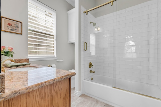 12715 Havant Cir, Houston, TX 77077 - full bath featuring vanity, healthy amount of natural light, combined bath / shower with glass door, and tile patterned floors