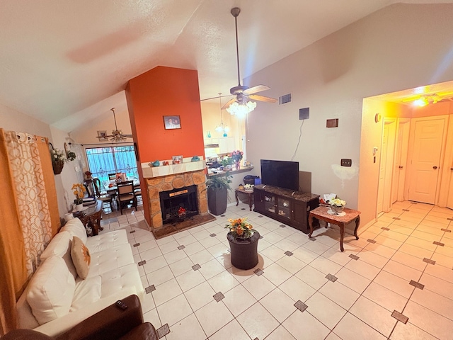 12943 Bamboo Forest Trl, Houston, TX 77044 - living area with a ceiling fan, high vaulted ceiling, light tile patterned flooring, and a fireplace
