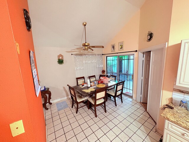 12943 Bamboo Forest Trl, Houston, TX 77044 - dining space featuring a ceiling fan, high vaulted ceiling, and light tile patterned flooring